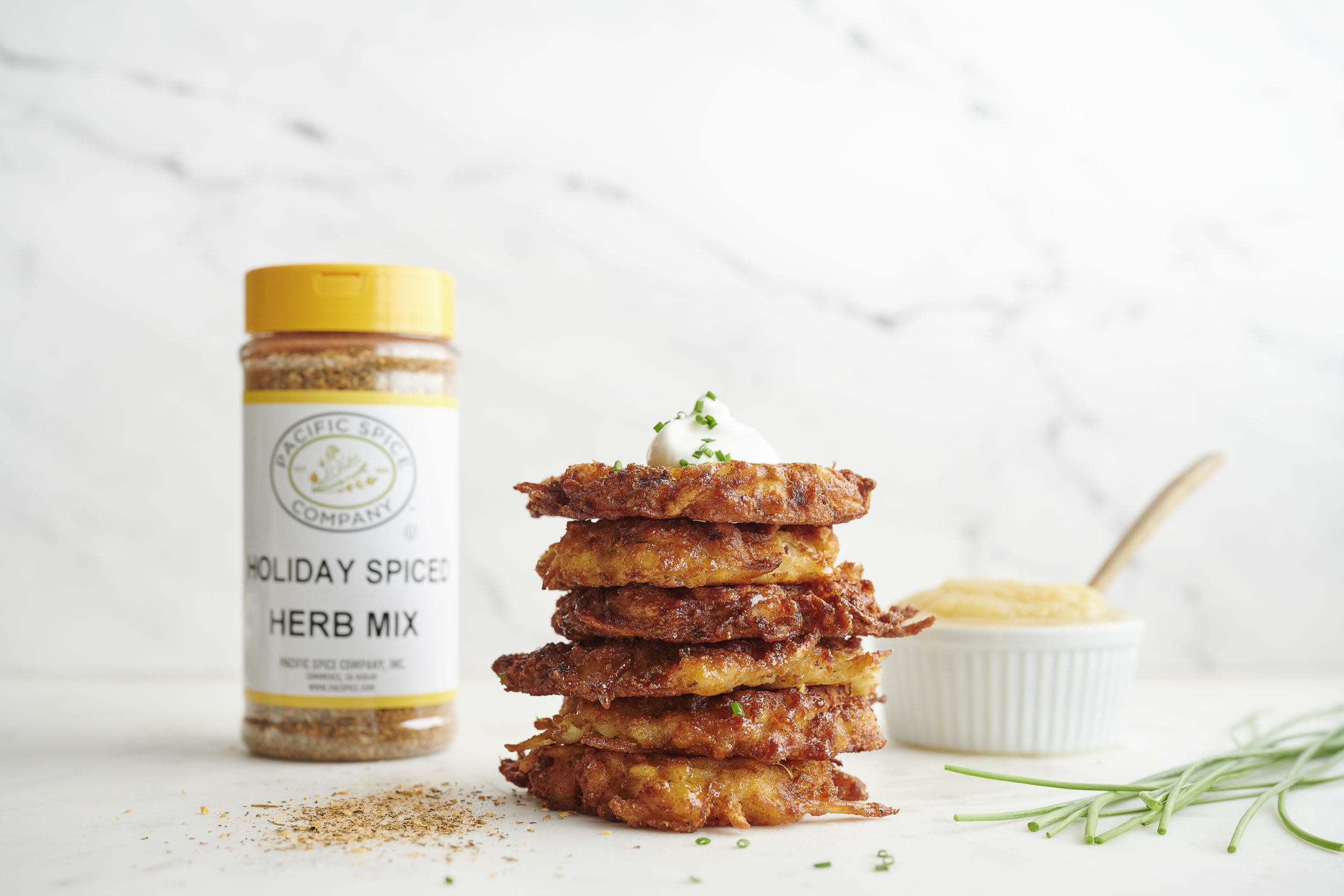 stack of fried potato latkes with Pacific Spice holiday spice herb mixs