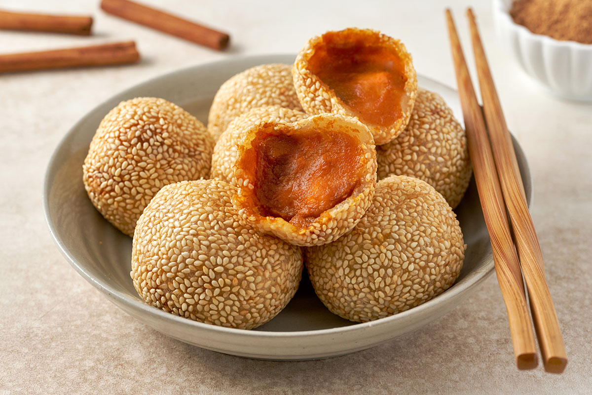 <em>Image: Pumpkin Spice Sesame Balls, with a crunchy sesame coating and soft pumpkin filling inside, featuring PSC Pumpkin Pie Spice.</em>